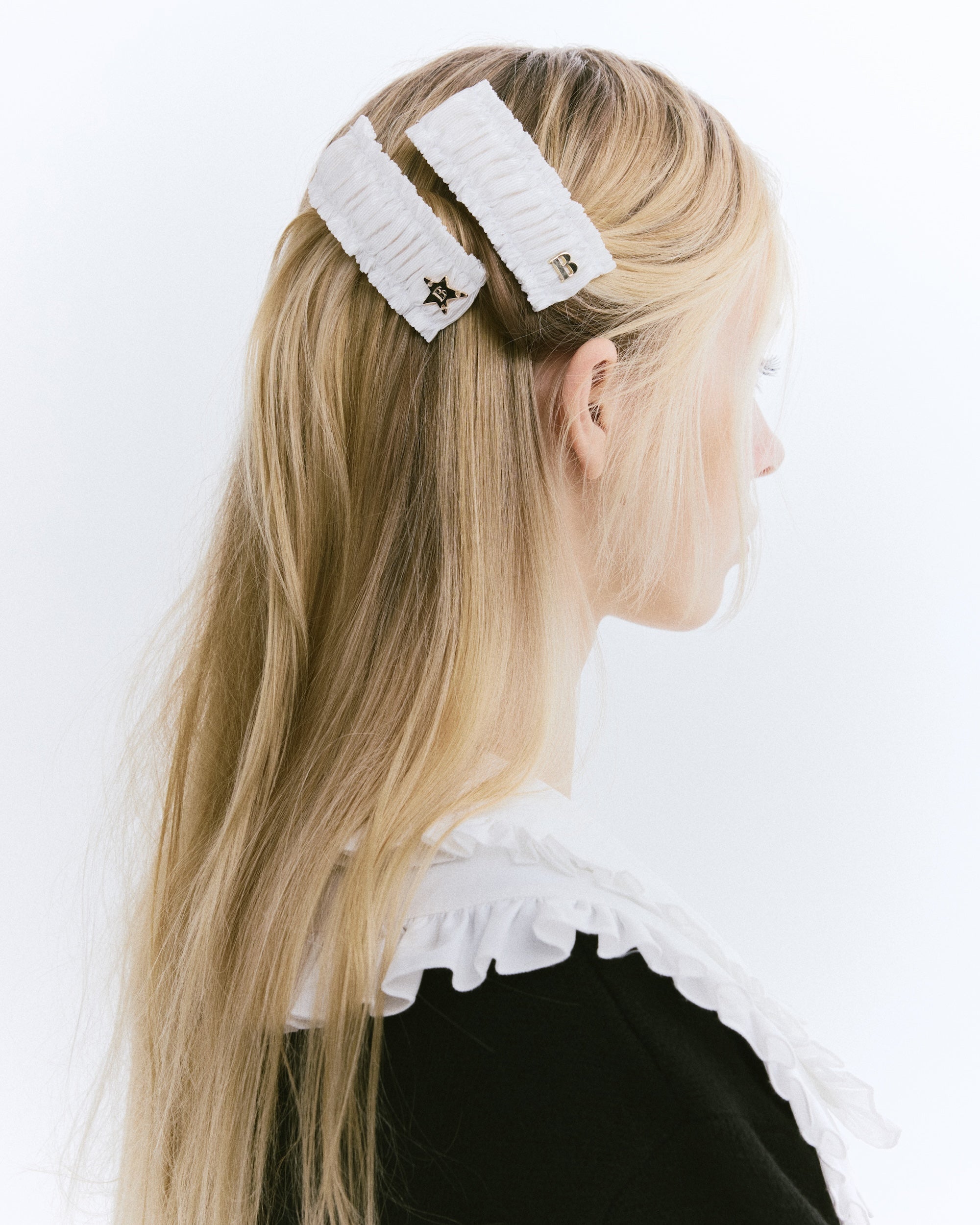B. SHUSHU HAIR CLIP